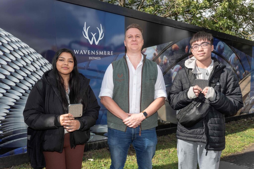 Shakira Rahman (age 16) and Jamie Tran (17), alongside Wavensmere Homes’ project director Ross Oates.