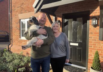 Eion-and-Gillian-Atkinson-with-Stan-the-cockapoo-scaled