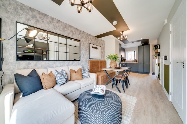 Open-plan living, dining and kitchen area in a Friar Gate show home